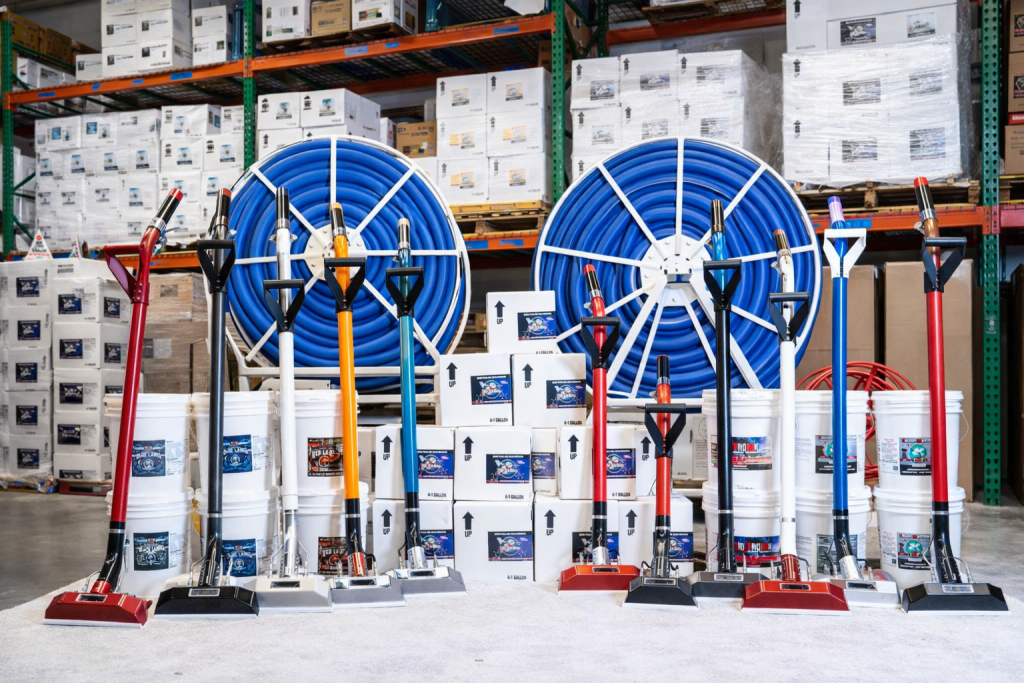a warehouse with multiple different carpet cleaning wands.